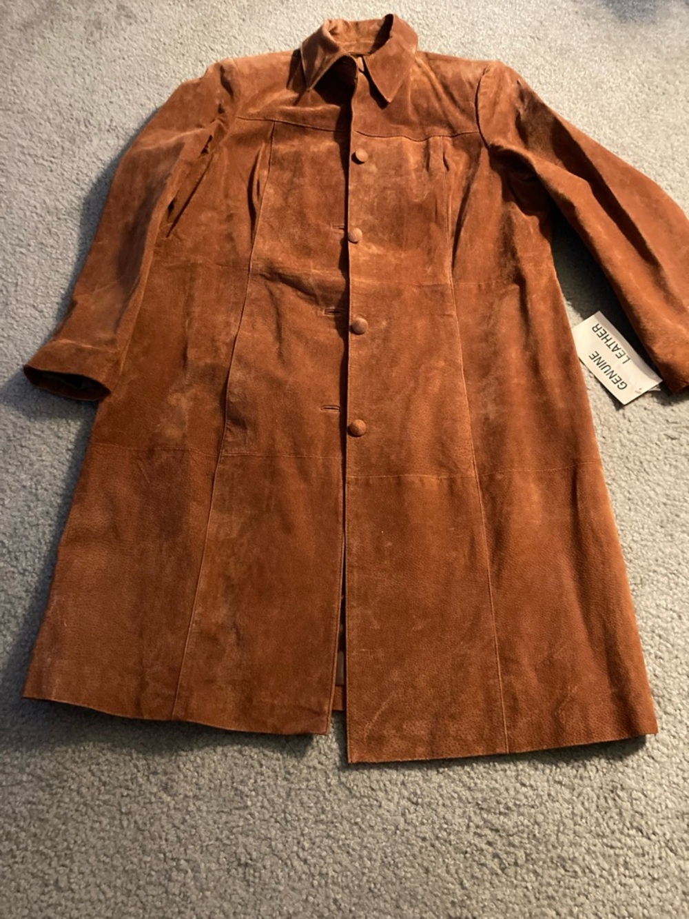 Woman’s leather coat and pants